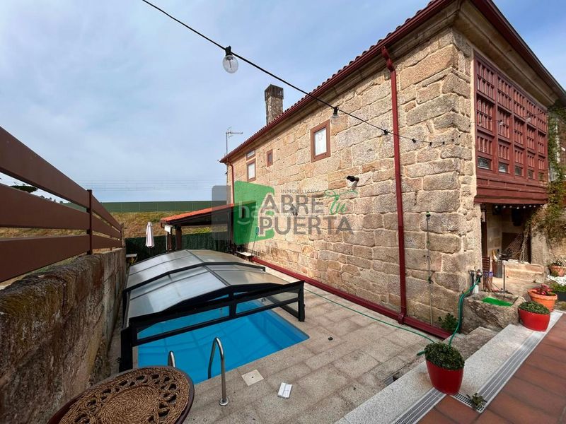 Foto ddd690e9-b526-47ab-badf-d3fbcf1f896c. Casa amb calefacció piscina a Amoeiro