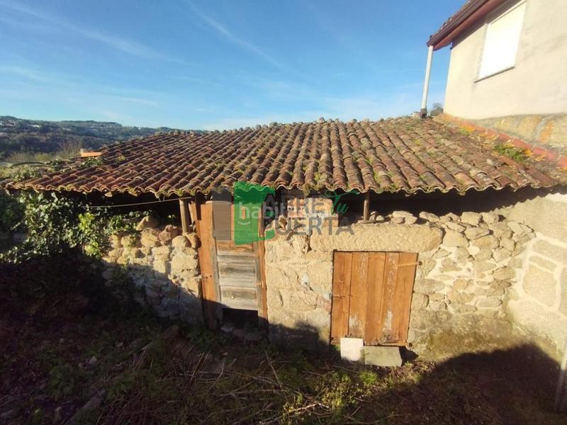 Foto f42f8bbb-2803-4834-ba59-970bf485a391. Maison dans As Lagoas Ourense