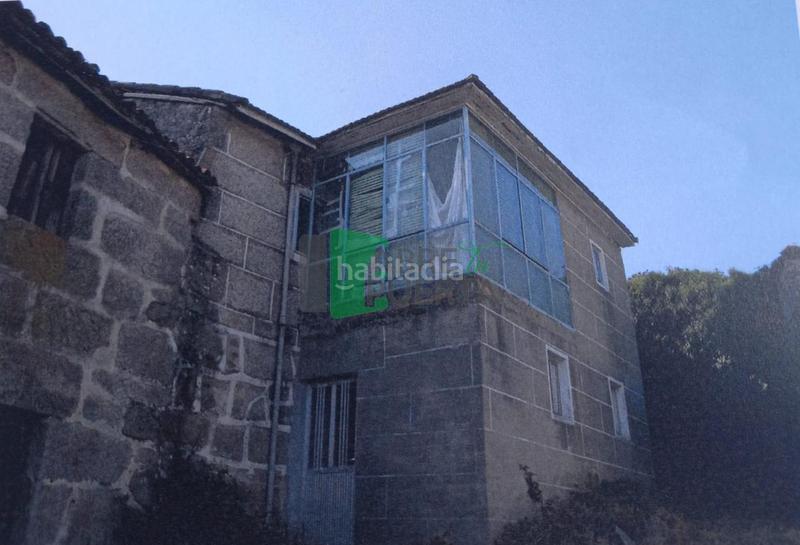 Foto aea4acfd-bec5-48e9-8a29-4ac8a4c60dbe. Casa a Xunqueira de Ambía