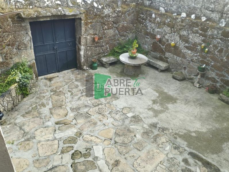 Foto 4e87078e-d750-4757-ae1a-50bb0bdd53e5. House with parking in Punxín