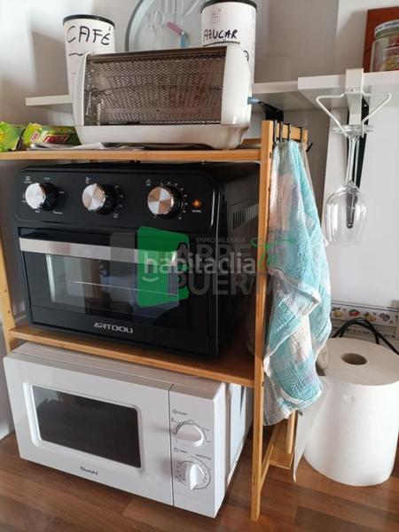 Foto 0678f4c8-1463-407d-901d-a75fc9ea450e. Planta baixa amb calefacció a Castrelo de Miño