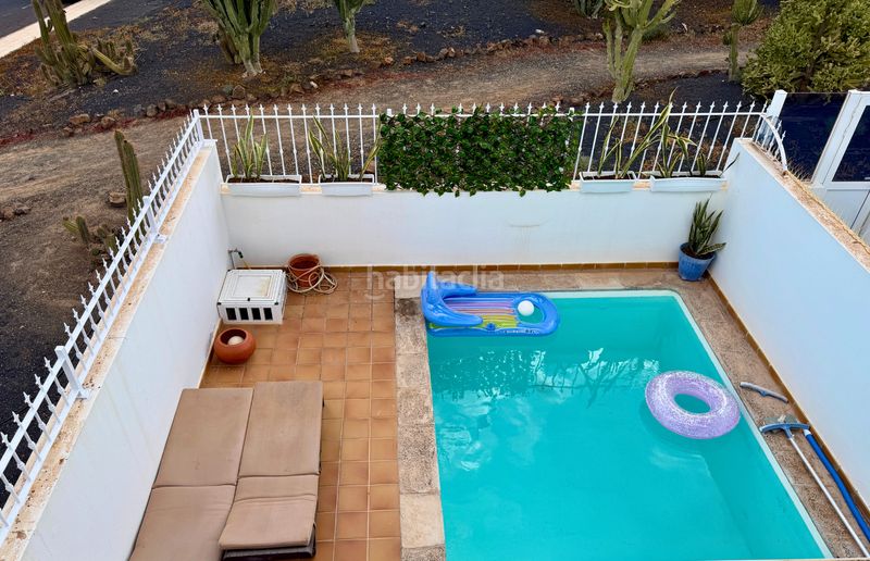 Foto e40046b0-1517-4a85-b67f-ce0eb6413bd7. Xalet amb aparcament piscina a costa Teguise Teguise