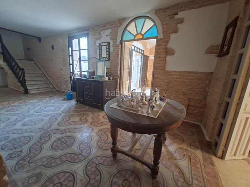 Foto 459c4a60-1cc1-45f2-ab81-086e02fb234f. Casa en calle manuel osuna 5 gran casa palacio en el centro en Umbrete