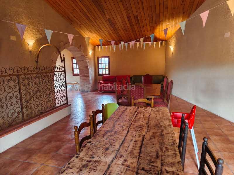 Foto 661af22d-c879-4b9f-b8d7-70e673dba3b0. Casa amb xemeneia aparcament a Garrigàs