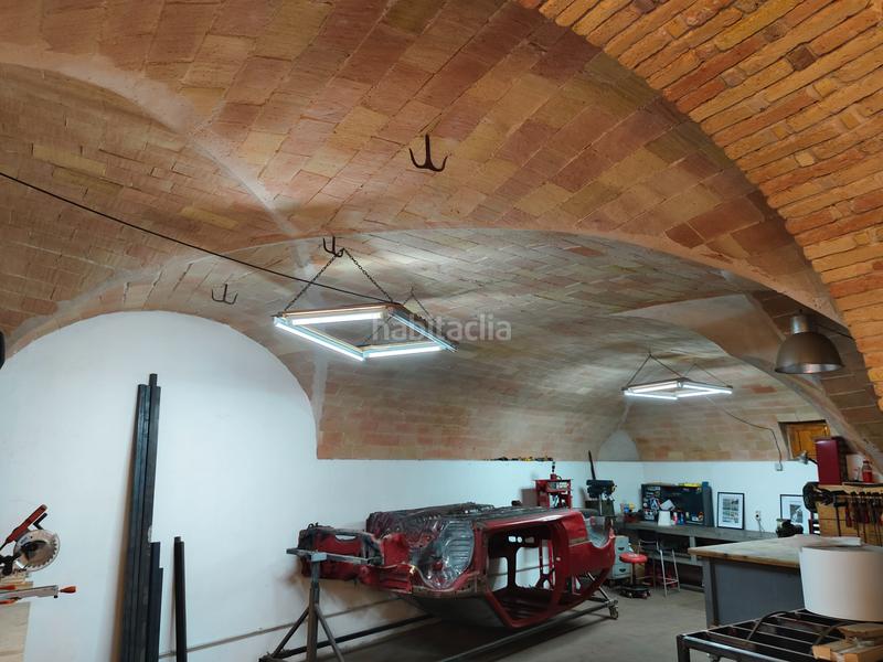 Foto 9095a76c-ce0d-4e78-90f1-fc0848be1429. Casa amb xemeneia aparcament a Garrigàs