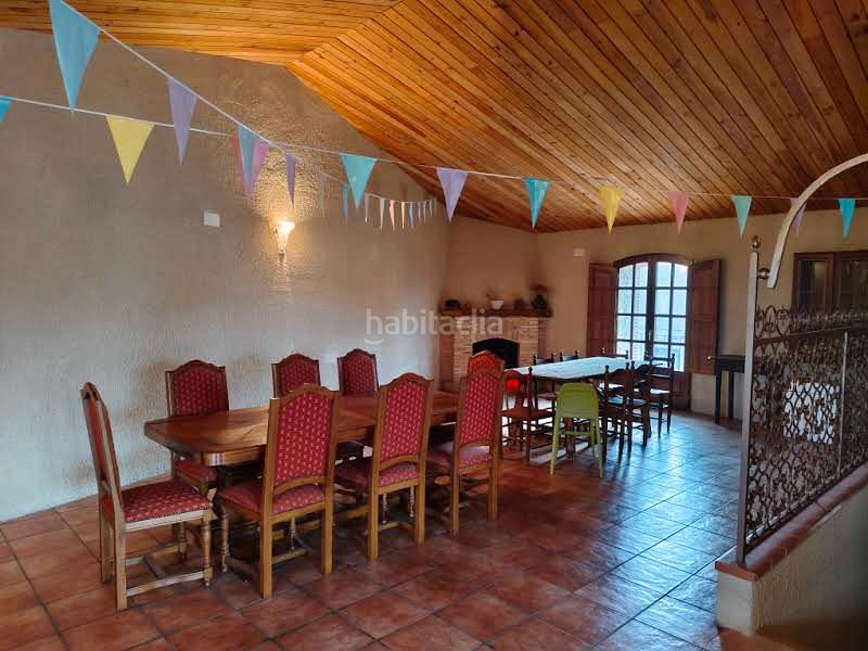 Foto cd1a1811-f0e6-42ec-984a-2b455f8c3c8a. Casa amb xemeneia aparcament a Garrigàs