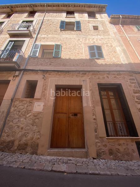 Foto 468d439a-cb75-42dd-93bc-238b9fd77642. Casa adossada amb xemeneia calefacció a Sóller