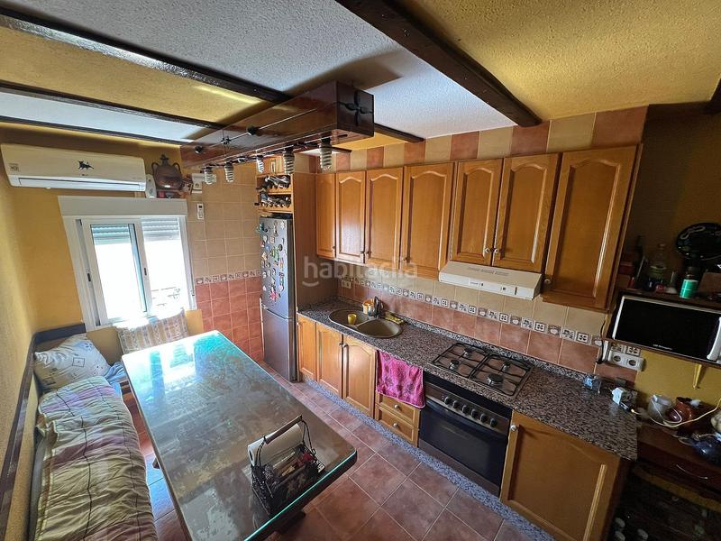 Foto 014bfb8f-741a-46f1-85e2-bea1a7760b4e. Casa adosada en Elche de la Sierra