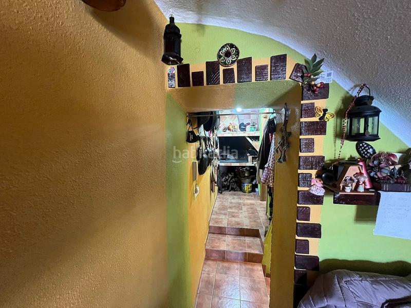 Foto 60bf6723-df18-4a6a-8f14-ea5176e329c9. Casa adosada en Elche de la Sierra