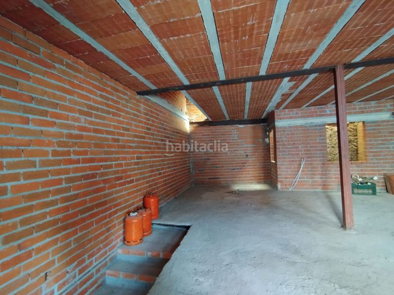 Foto caa71a89-725c-4632-a503-cfbb73723161. Casa adossada a Serradilla