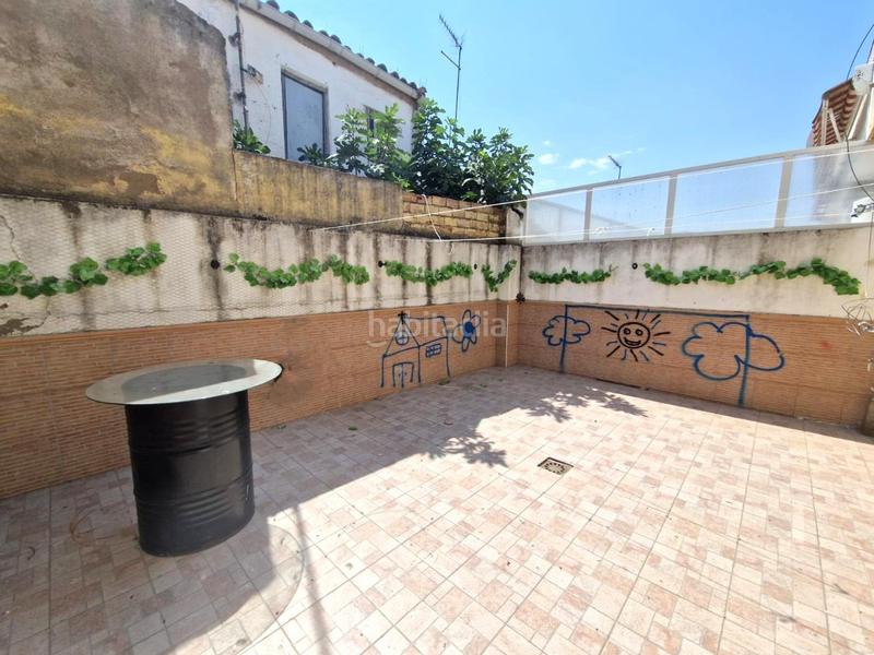 Foto cf51aea8-3084-4c20-8efc-f364455f8ab9. Casa adosada  en venta amplia y luminosa, con garaje y patio privado en Moraleja