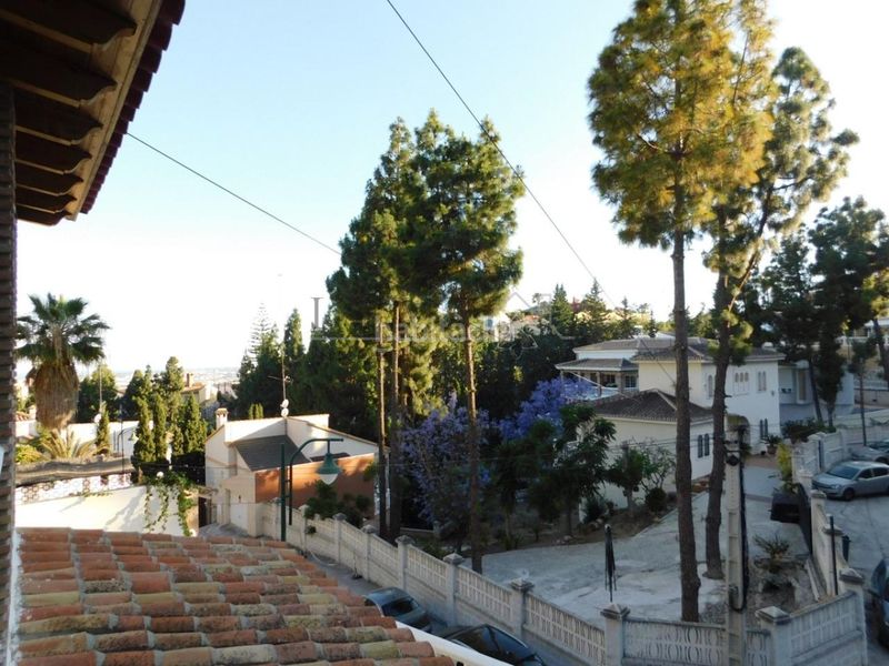 Foto a56e6350-0b08-407c-b7a1-00d5fdab32d8. Casa amb calefacció aparcament a El Atabal Málaga