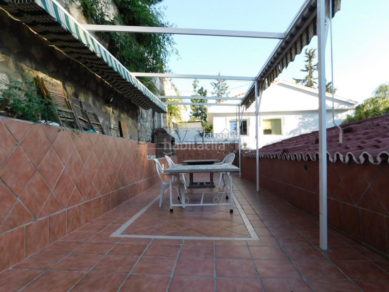 Foto c017cf72-f637-4f2f-95c7-d3db5a44fc98. Casa amb calefacció aparcament a El Atabal Málaga