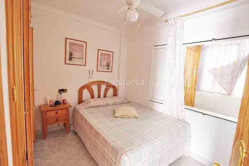 Foto 8f561b4a-d63d-428d-aaba-54b44b24bceb. Apartamento en calle ramon y cajal 3 en venta apartamento con amplia terraza a escasos metros de la playa centro en Guardamar del Segura