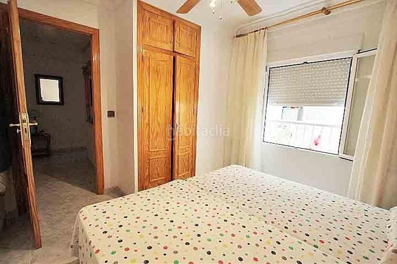 Foto 9a16fe8b-b379-473f-8f3b-1ce86372391d. Apartamento en calle ramon y cajal 3 en venta apartamento con amplia terraza a escasos metros de la playa centro en Guardamar del Segura