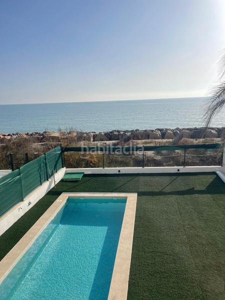 Foto 5f3ba093-6eed-43ca-bba5-44c91fd4c4cd. Chalet  de lujo delante del mar en Playa Burriana