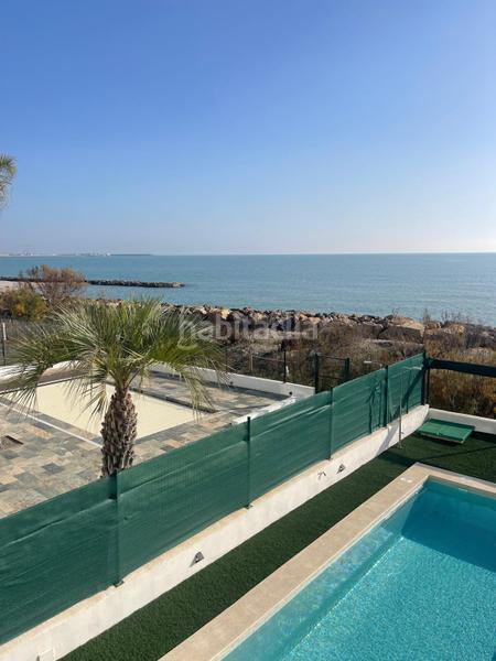 Foto cf341c06-8f22-4e76-acc1-a598e7ead8fb. Chalet  de lujo delante del mar en Playa Burriana