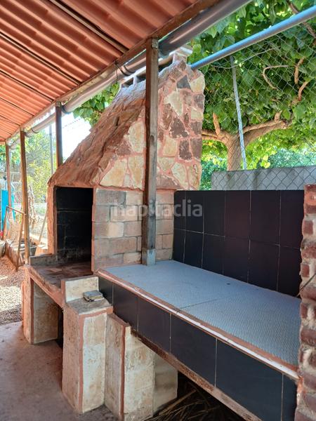 Foto f019b0e5-5e0a-4842-b4dc-78ea05a7f364. Chalet dans camí el marge 127 dans Piscinas Burriana