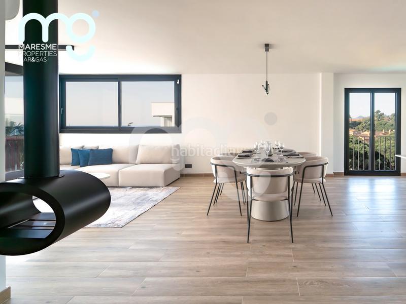 Foto bc987b16-9178-4287-be9e-781ff5614d5b. Àtic amb xemeneia calefacció aparcament piscina a Sant Andreu de Llavaneres