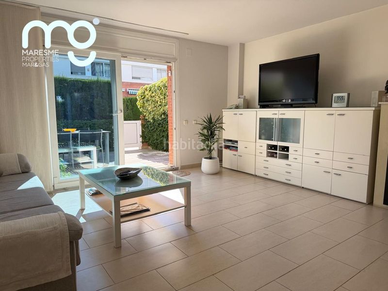 Foto ddcc47d6-484d-4eb6-b9ee-b1df4adeb5a1. Casa aparellada amb xemeneia calefacció aparcament piscina a Premià de Mar