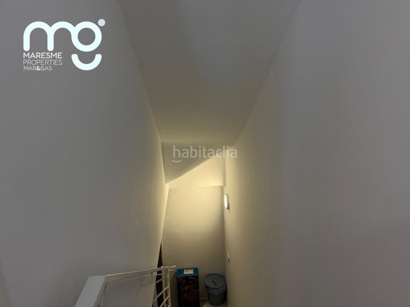 Foto ea8b35e0-ad75-4674-897c-481c128630f9. Casa aparellada amb xemeneia calefacció aparcament piscina a Premià de Mar
