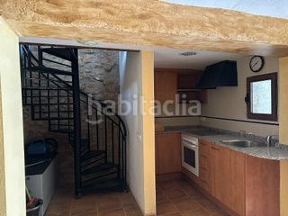 Foto 81a5ec5d-c4ba-4e74-ade5-8f7b808e80a9. Casa adossada a Benlloc