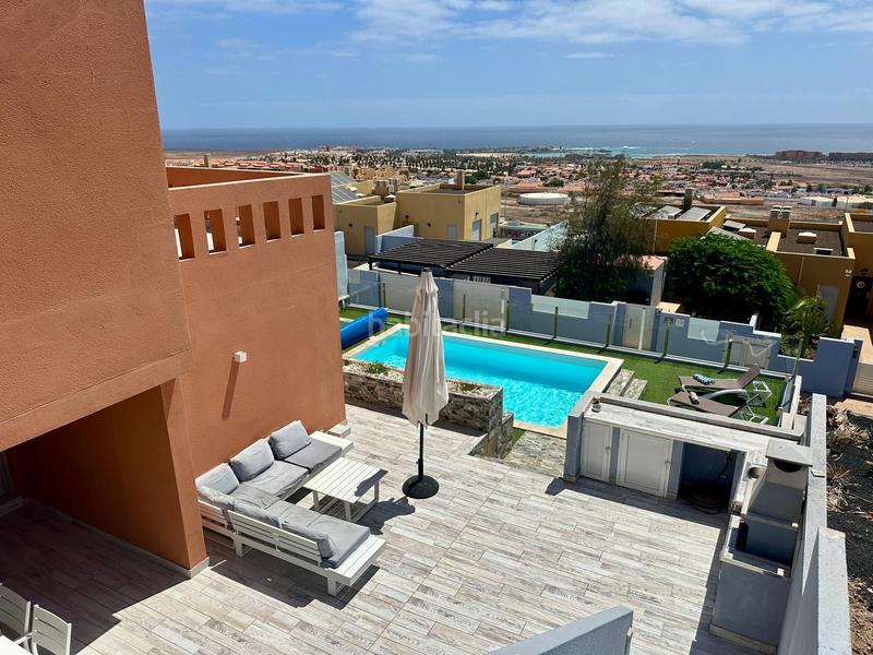 Foto 9e98b0c6-3ee1-4451-905c-7f0ba4e6cdff. Casa fantástico chalet en Caleta de Fuste zona caleta alta en Antigua