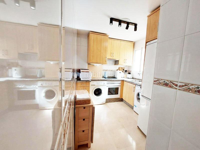 Foto b855a462-d569-4bd5-8619-c8bbe903f920. Piso  2 dormitorios, 2 baños con 2 garajes en arenal golf en Benalmádena