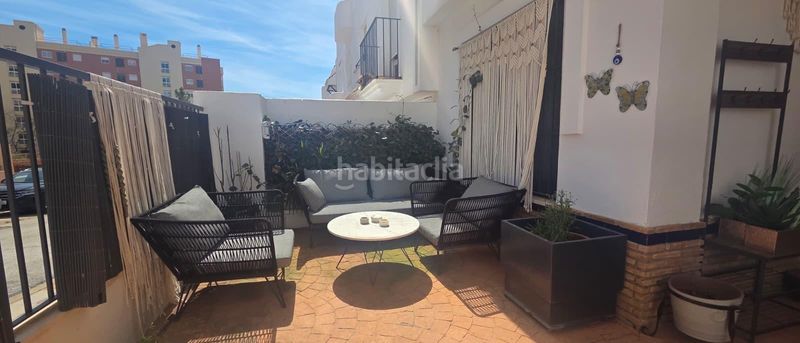 Foto 680e8f9c-44f3-4784-9c0f-05fe3fe098ea. Casa adossada amb aparcament piscina a Torreblanca del Sol Fuengirola