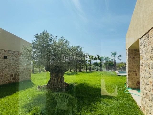 Foto b3e65fb1-7a4a-46a6-a5ca-c97c15471799. Masia amb piscina a Petra