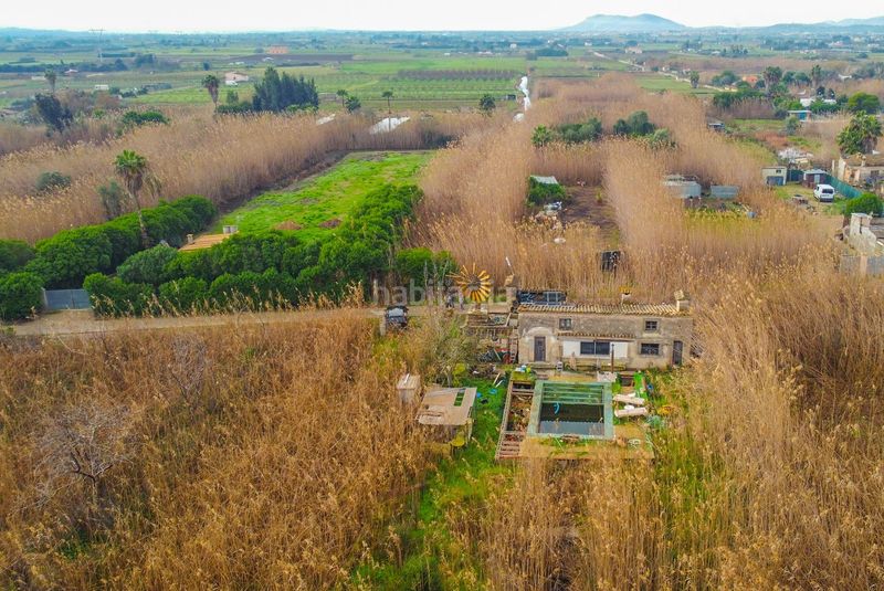 Foto 2828de62-c405-434a-ba7f-0a9d3753ce07. Masía rústica con piscina en el parque natural de salbufera en Sa Pobla