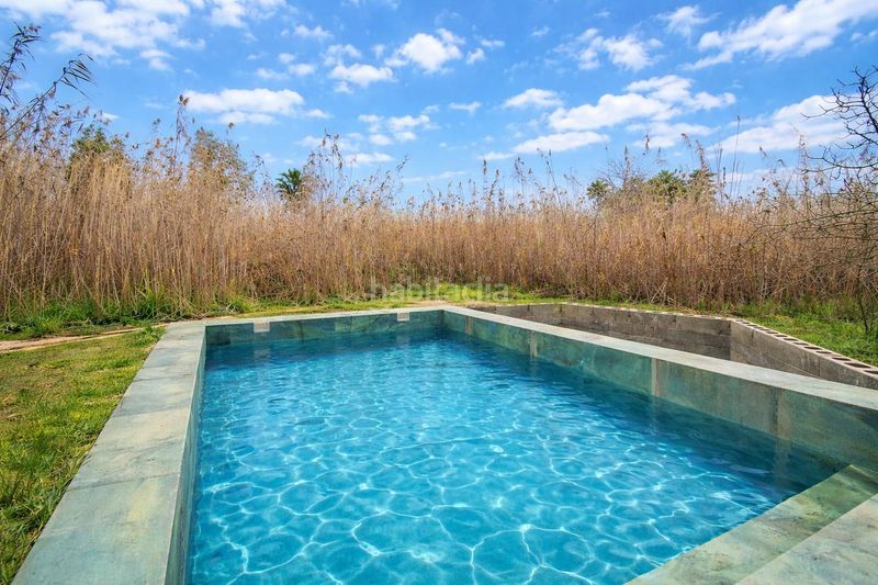 Foto 463017bf-b0ec-4131-bc88-30ce7b9ac6c1. Masía rústica con piscina en el parque natural de salbufera en Sa Pobla