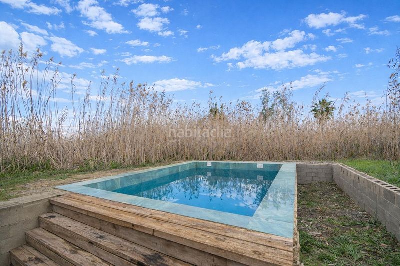 Foto 4bec41b0-916e-45f9-960e-55aee926853f. Masía rústica con piscina en el parque natural de salbufera en Sa Pobla