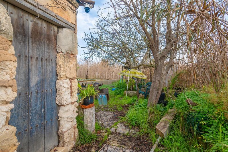 Foto 56a17a36-df61-4806-b4bd-48343d6e2728. Masía rústica con piscina en el parque natural de salbufera en Sa Pobla