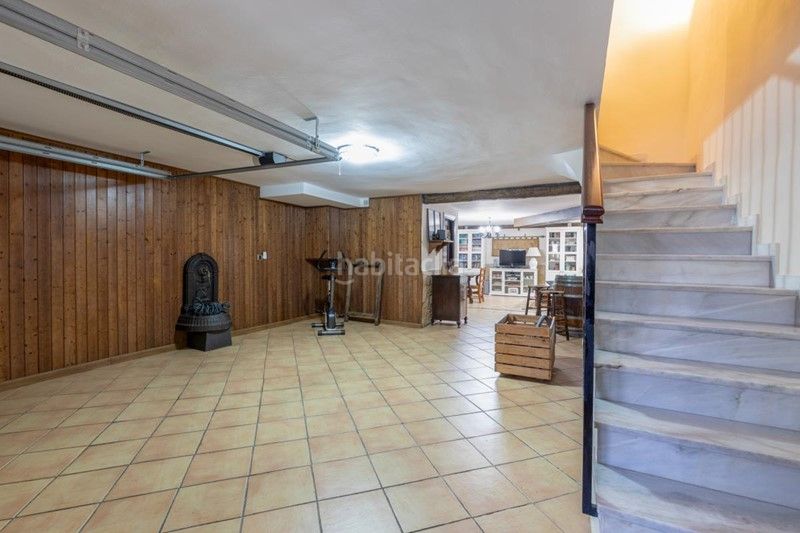 Foto 58d85147-02db-49c5-a5a9-1941fd6cb687. Casa adossada amb xemeneia a Maracena