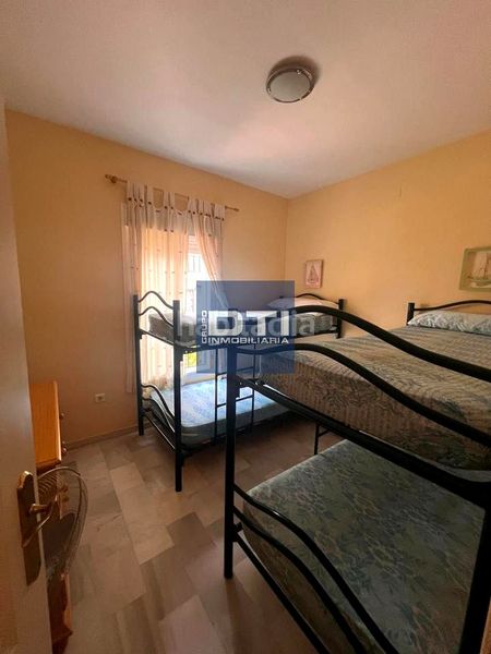 Foto 6a1d71ff-0fee-418d-83e2-7d4ee3529450. Casa amb aparcament piscina a Islantilla golf Islantilla