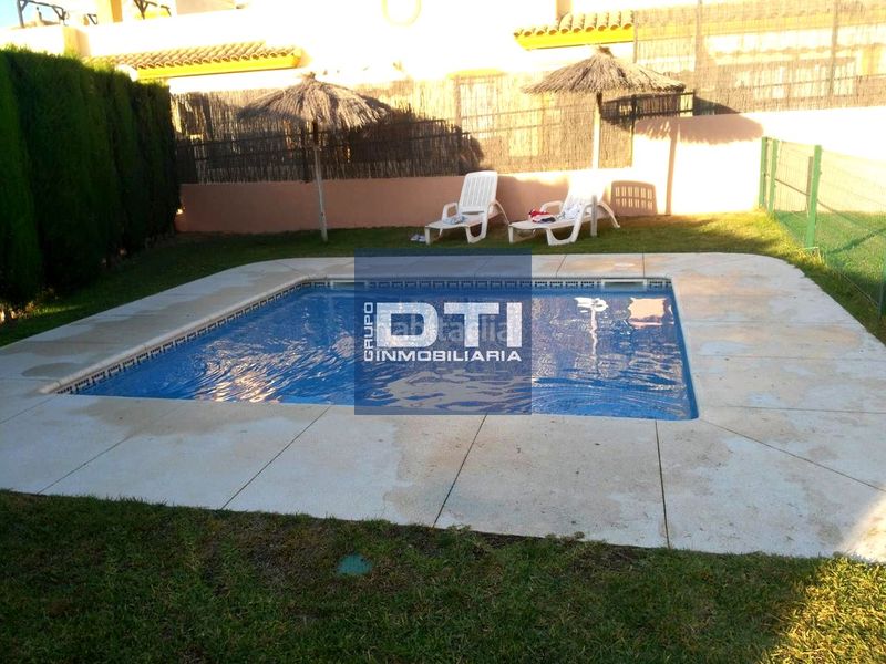 Foto f62bab53-568a-48b3-89e1-8c6094a06c44. Casa amb aparcament piscina a Islantilla golf Islantilla