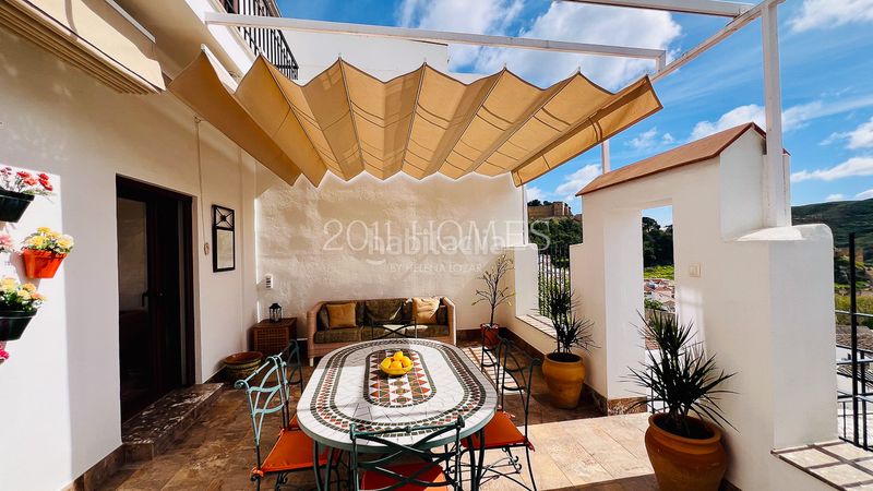 Foto e6b86dcb-585c-49f6-82ae-79f4b39dd879. Casa amb xemeneia calefacció aparcament a Casco Histórico Antequera