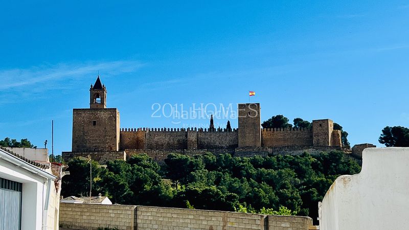 Foto fe80a534-0a8a-4bdd-a27b-92a31c424bc4. Casa amb xemeneia calefacció aparcament a Casco Histórico Antequera