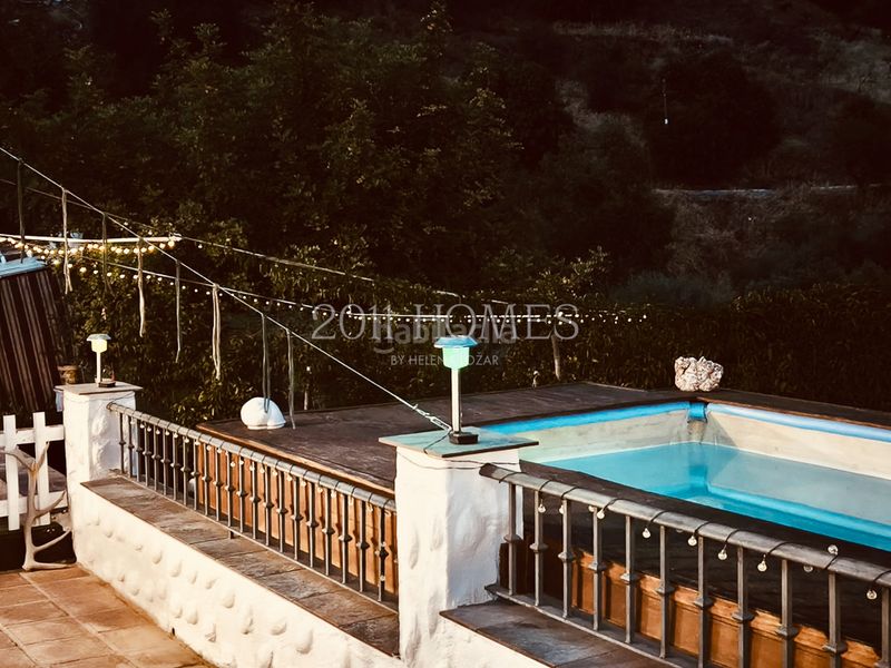 Foto bd214f0d-4255-4433-84c5-dbfbbd76510f. Masia amb xemeneia aparcament piscina a Almogía