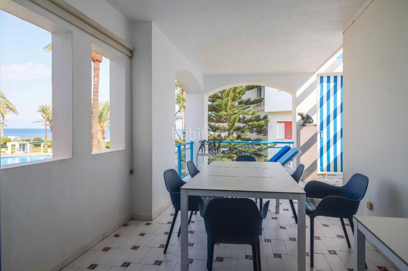 Foto d69c4f76-4db4-4a39-9716-3c69feef158b. Ático  en primerísima línea en residencial con piscina en Dénia