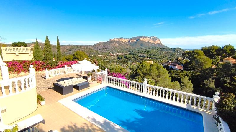 Foto f95f455c-bc09-4c6d-be6b-8f4be8c174ad. Xalet amb xemeneia aparcament piscina a La Xara-La Sella Dénia