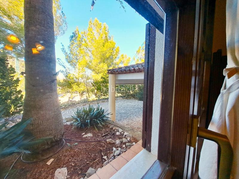 Foto 86c3f8b6-dcce-4680-b8fb-e56bfd74e27e. Chalet with fireplace heating parking pool in La Xara-La Sella Dénia