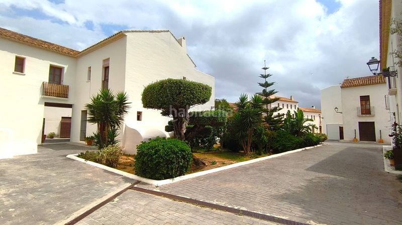 Foto 4c543051-68b1-4886-8387-aa662c49d54a. Casa adossada amb xemeneia calefacció aparcament piscina a Dénia