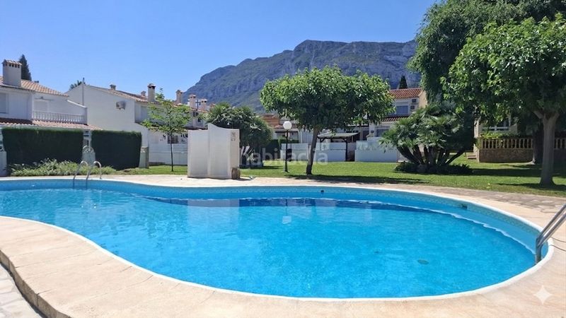 Foto ab6cfd50-5bf4-4ff4-8bd1-1332e216df22. Planta baixa amb aparcament piscina a El Montgó Dénia