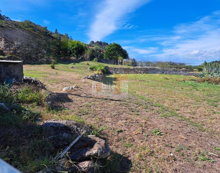 Foto 17f1b88e-da69-4e55-ba66-f7ea3f2fa2dc. Terreny residencial a O Hío Cangas