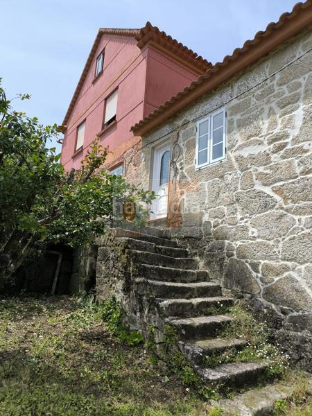 Foto 1832b90d-b801-4839-9037-87bb8a5265d5. Haus mit heizung parking in Moaña