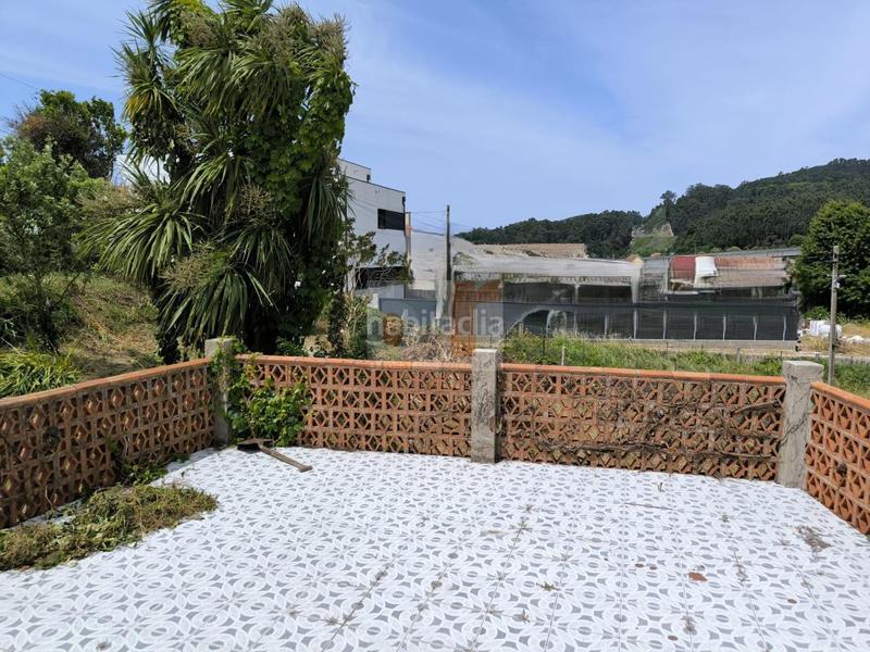 Foto 75ef3498-7537-4869-af78-81942f68812e. Haus mit heizung parking in Moaña