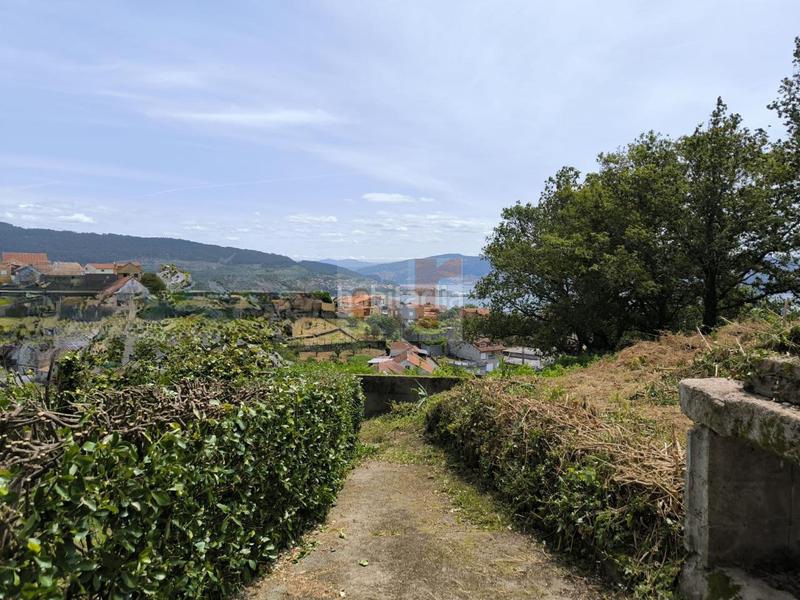 Foto 77a35bef-3402-4e41-acb0-3ca0fa641f16. Haus mit heizung parking in Moaña