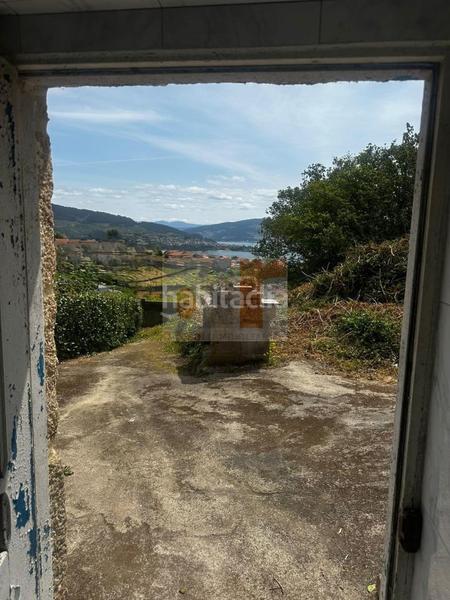 Foto ae3e1a01-3556-4ecc-aa9f-90e246e2406b. Haus mit heizung parking in Moaña